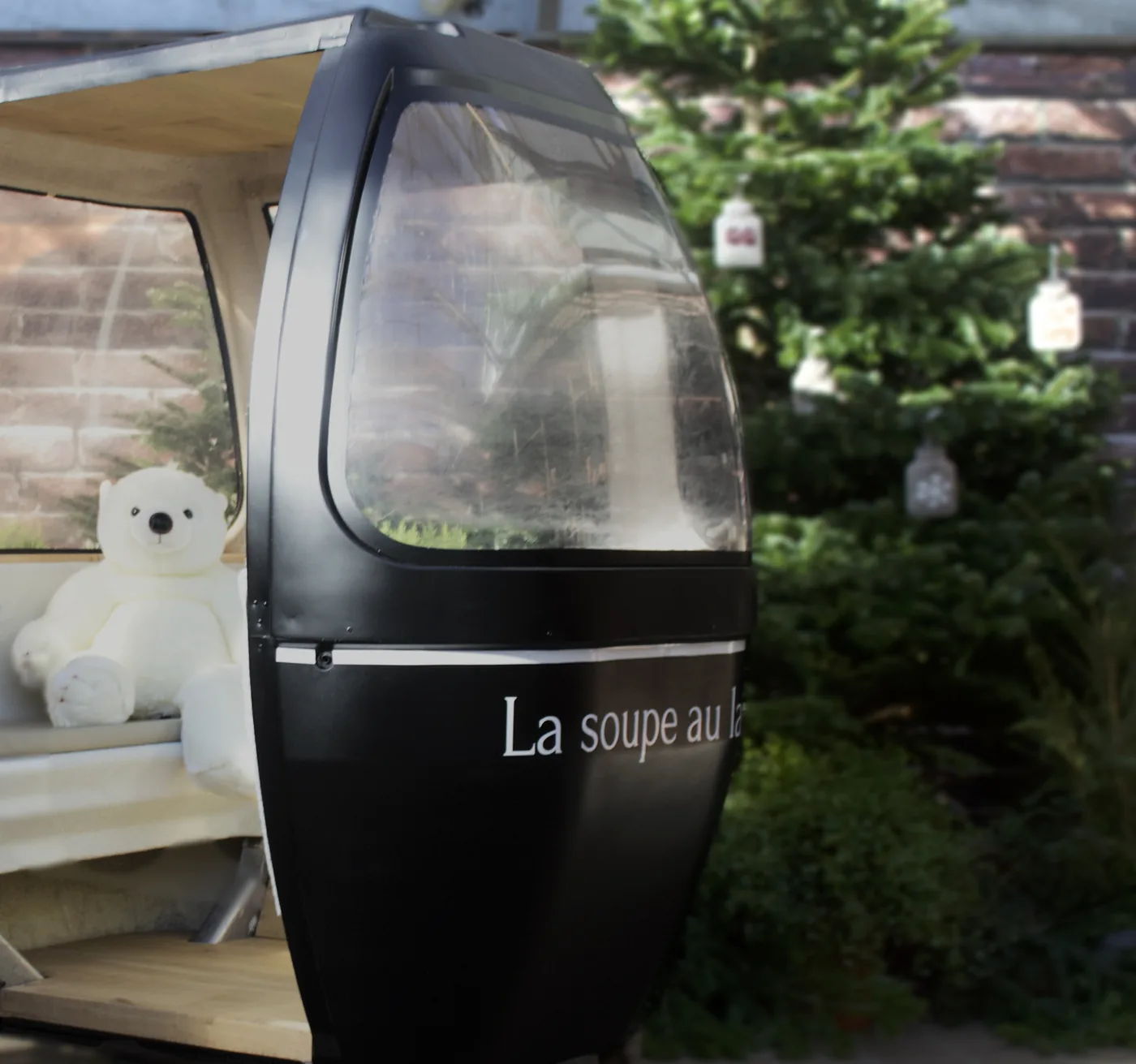 Side profile of the Dining Gondola at La Soupe au Lait