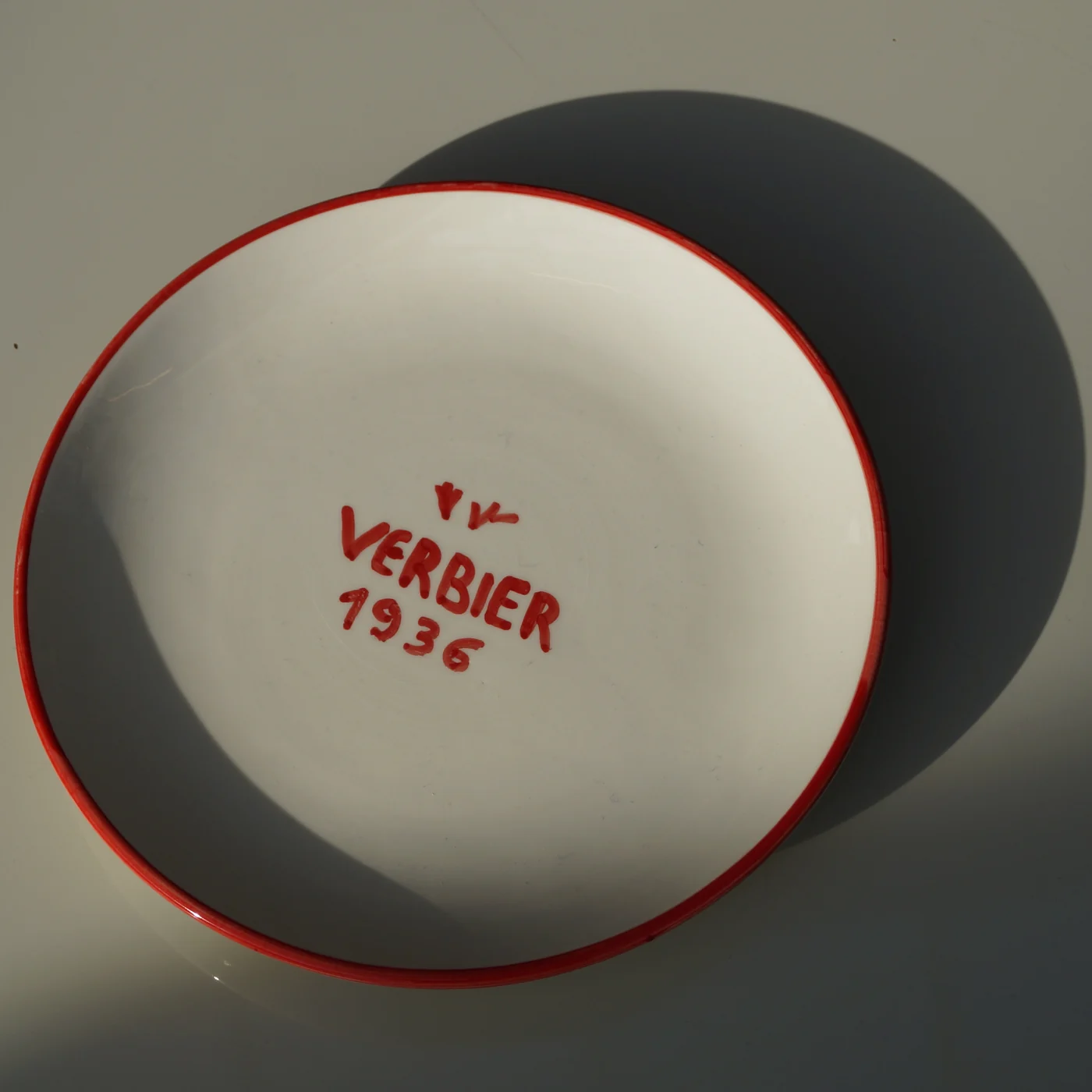 Hand-painted Verbier 1936 porcelain plate, red script signature on white